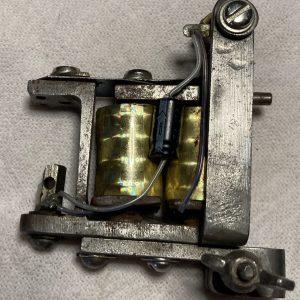 Vintage tattoo machine, handmade by legendary tattoo artist and toolmaker, Franklin Paul Rogers.