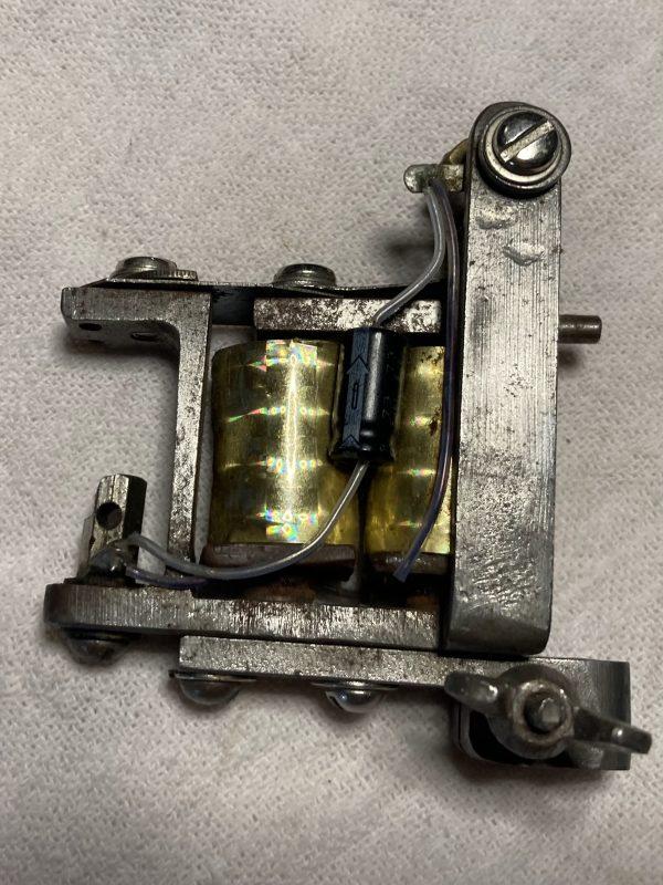 Vintage tattoo machine, handmade by legendary tattoo artist and toolmaker, Franklin Paul Rogers.